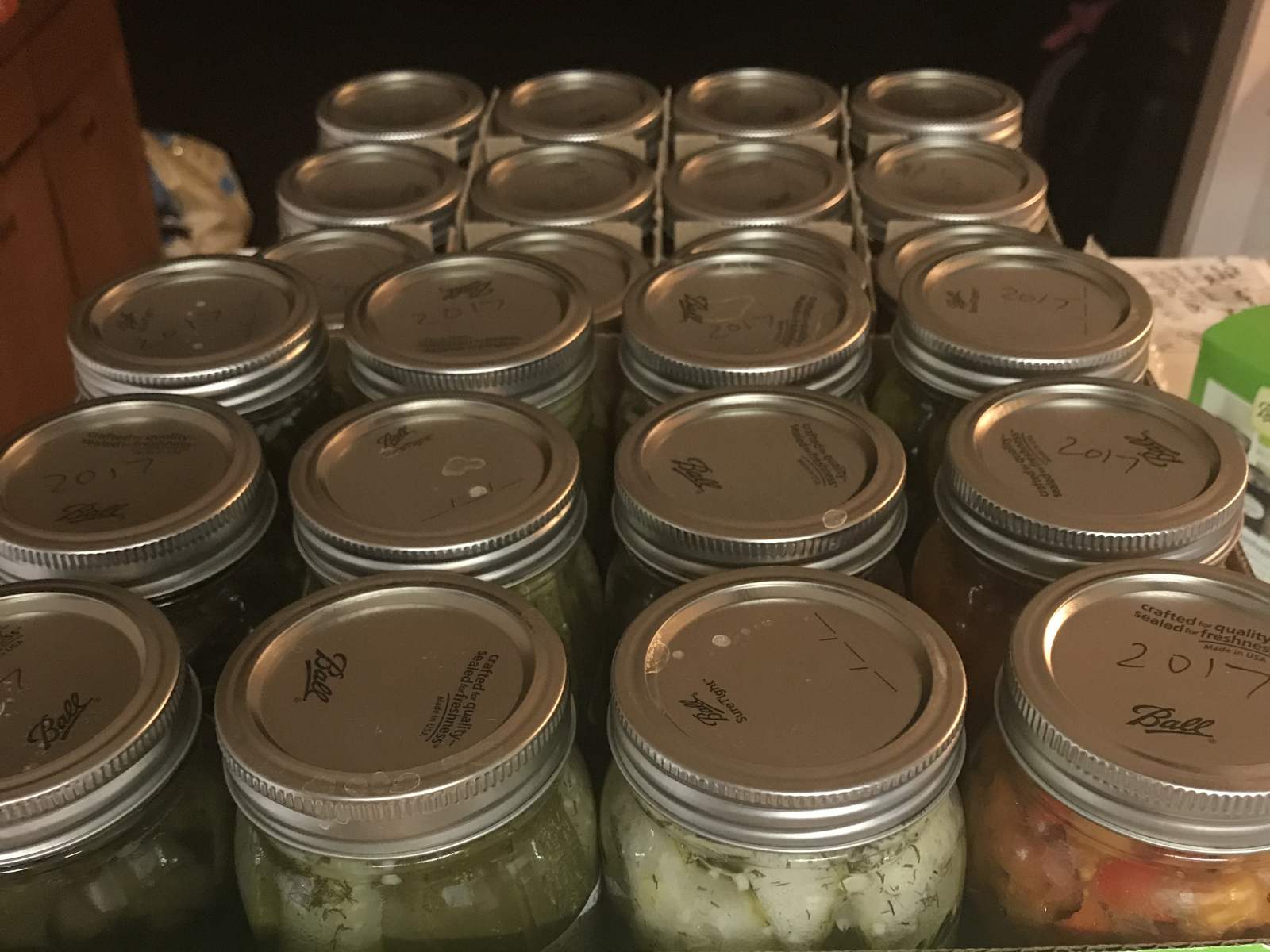 Rows of canning jars ready in the kitchen