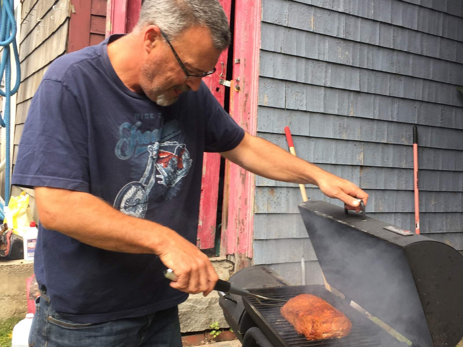 Rick tending the smoker