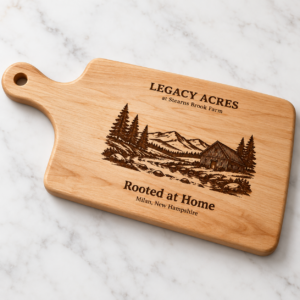 Rooted at Home engraved maple paddle cutting board from Legacy Acres at Stearns Brook Farm