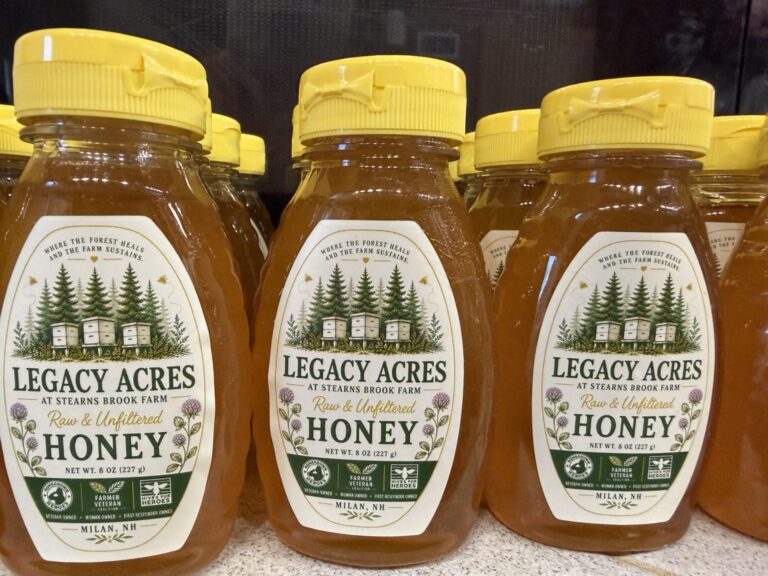 Legacy Acres raw and unfiltered honey in yellow-capped squeeze bottles