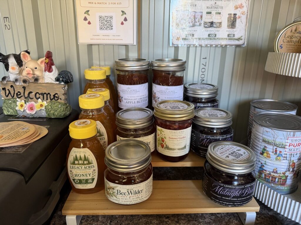 Shelves of Legacy Acres honey and Woodland Pantry jars